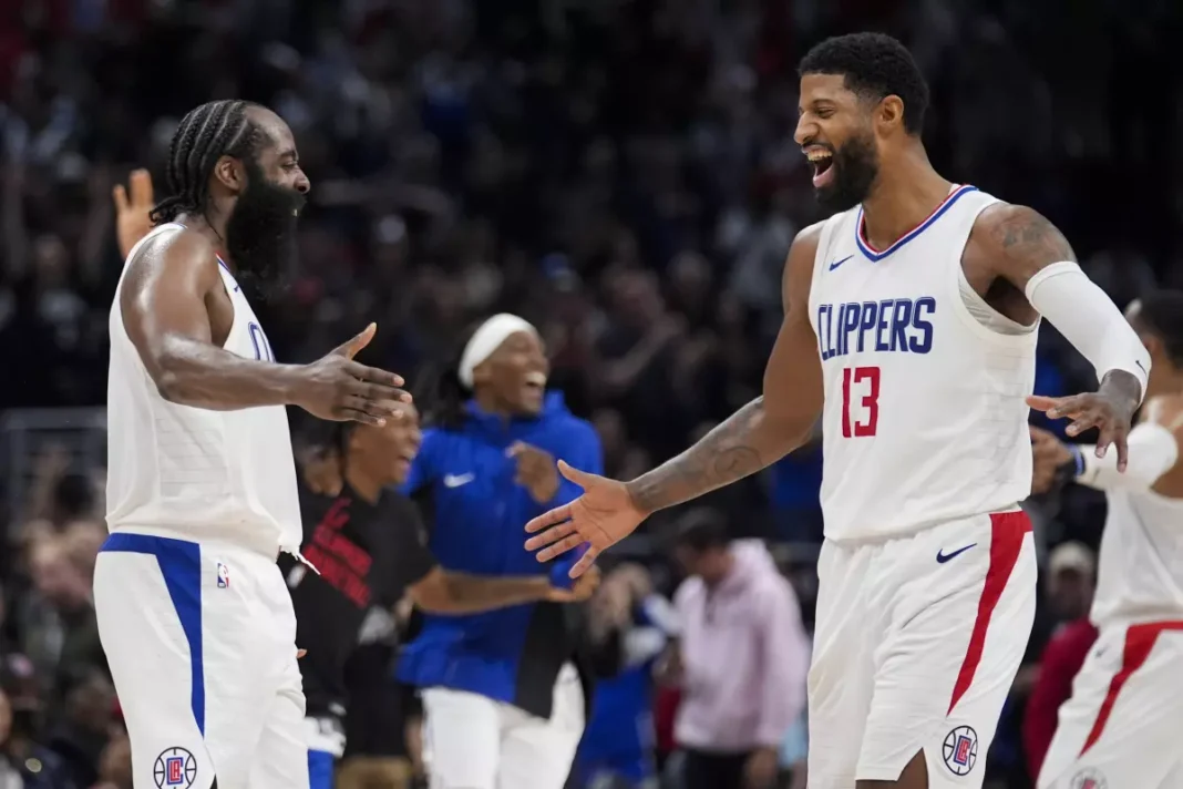 James Harden (left) and Paul George (right) shared their excitement about how the Clippers played in the 114-125 home win over the Brooklyn Nets - AP Photo/Marcio Jose Sanchez